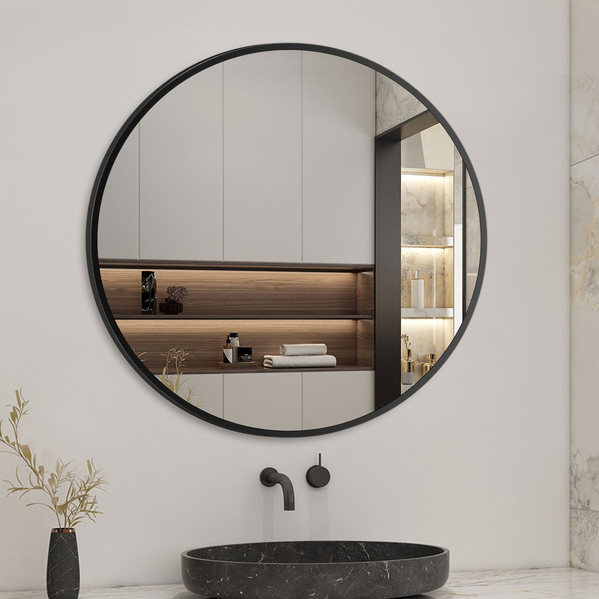 black framed round mirror